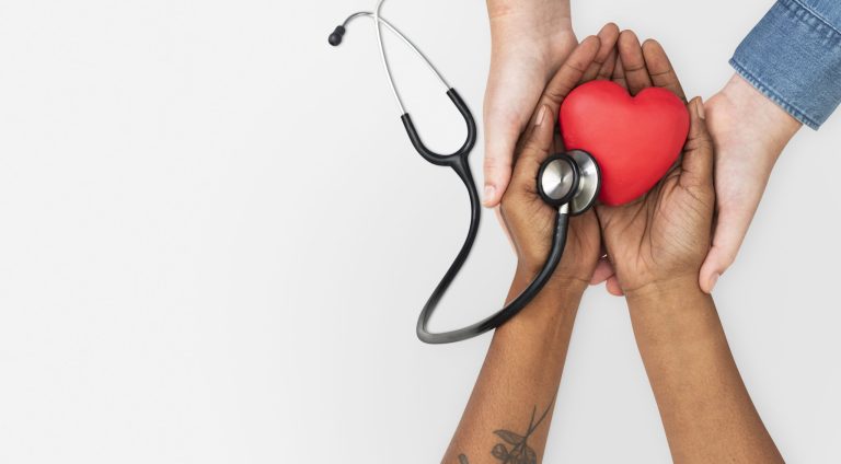 Hand cupping stethoscope health concept